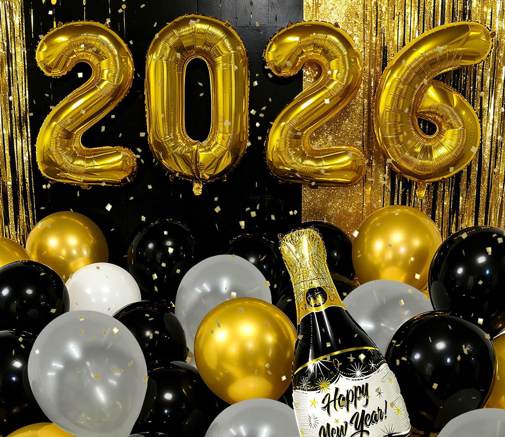 Gold '2026' balloons with a bottle of champagne with Happy New Year on label with white, gold and black round balloons and balloons against a gold background.